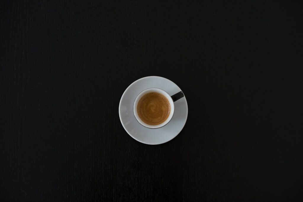 White Ceramic Coffee Cup on White Saucer