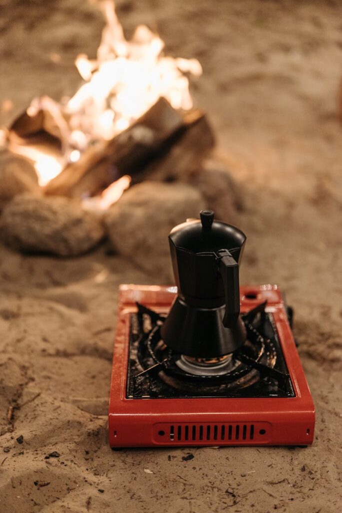 Black Coffee Pot on Brown Wooden Table